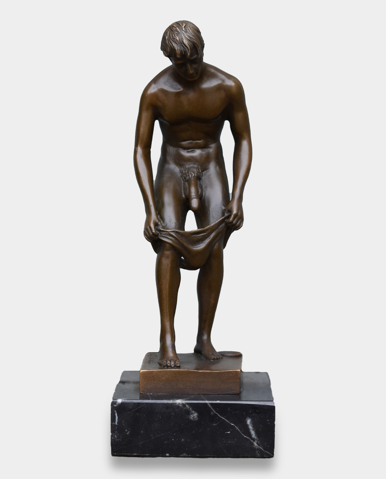 Man Undressing Bronze bronze-sculpture-art.com