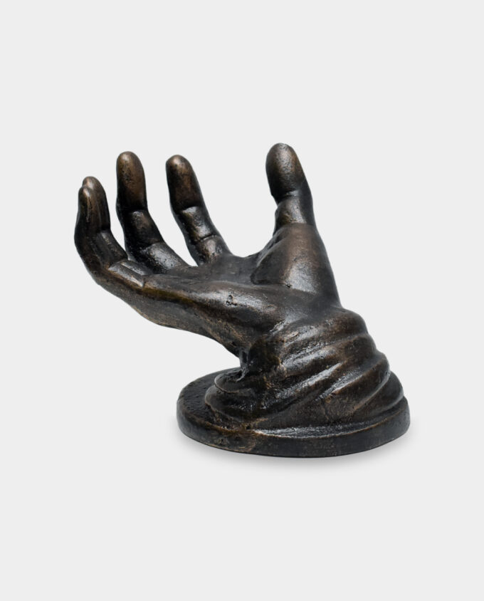 Cast Iron Figurine On the Hand